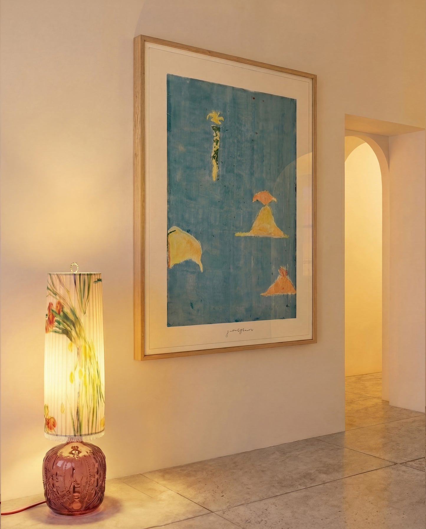 Islands by Jakob Steen, framed in oak and hung in a calm, minimal interior.