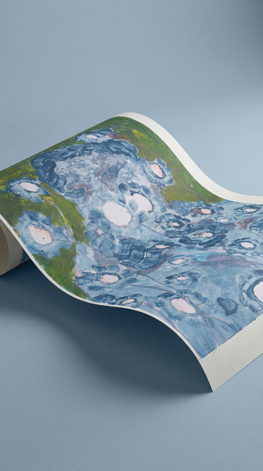 FLOWER BOY print by Jakob Steen, shown partially rolled in a studio setting.