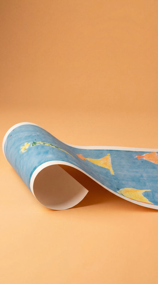 Islands print by Jakob Steen, shown partially rolled in a studio setting.