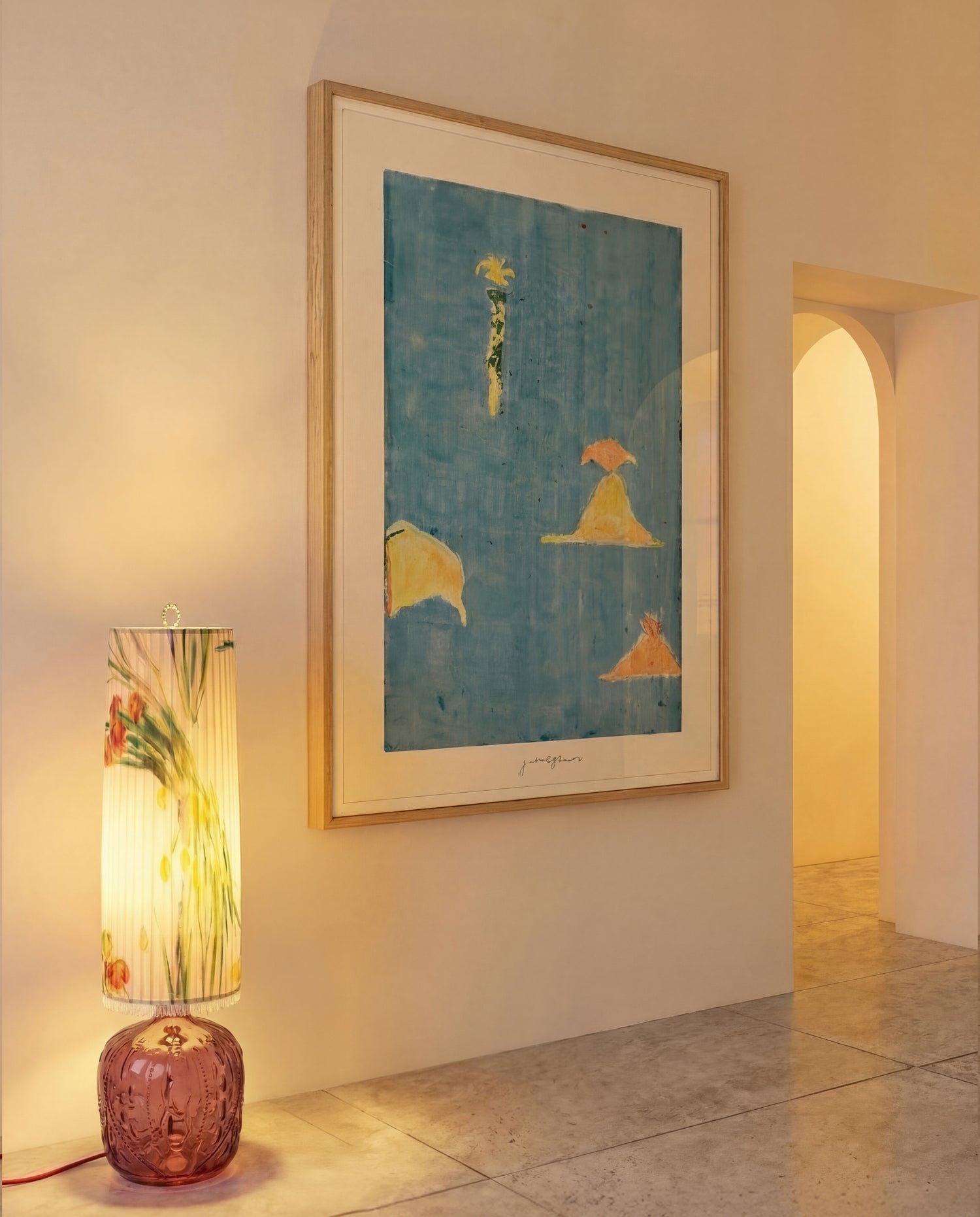 Islands by Jakob Steen, framed in oak and hung in a calm, minimal interior.